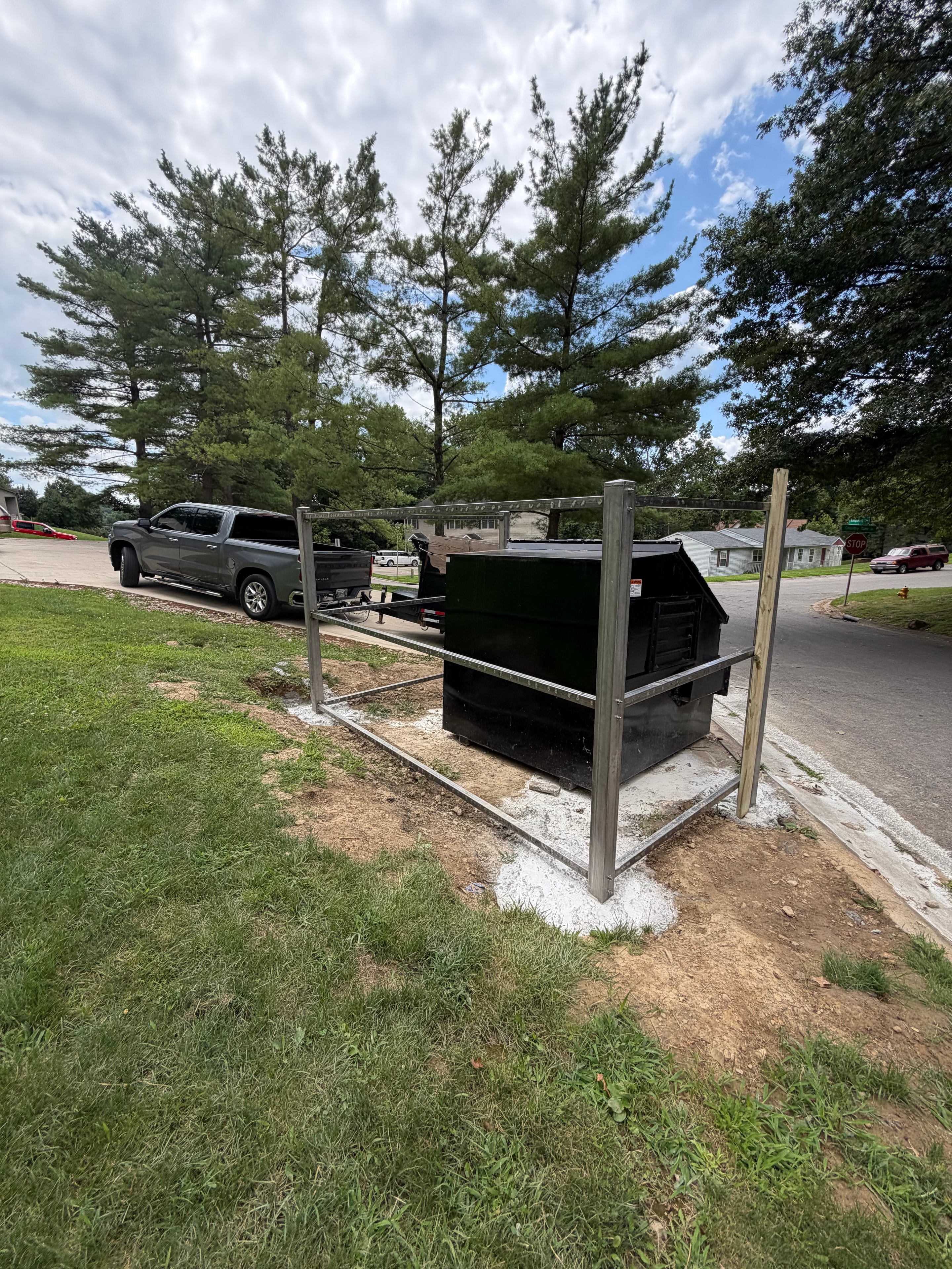 Trash enclosure steel cross brace framing